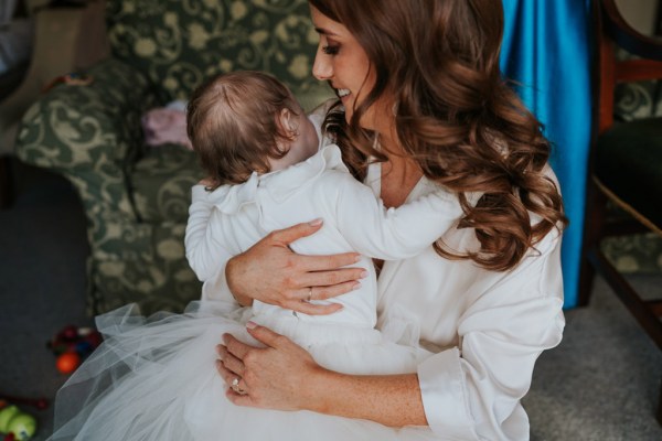 mother daughter hug babygirl smiling