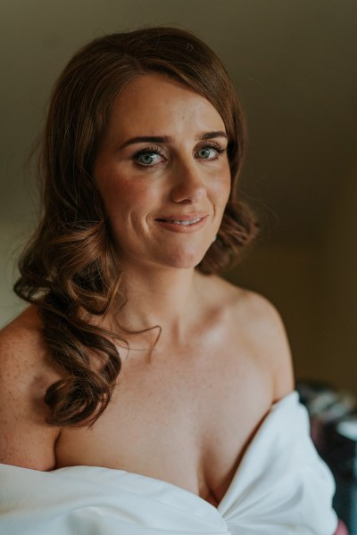 bride faces camera as she smiles