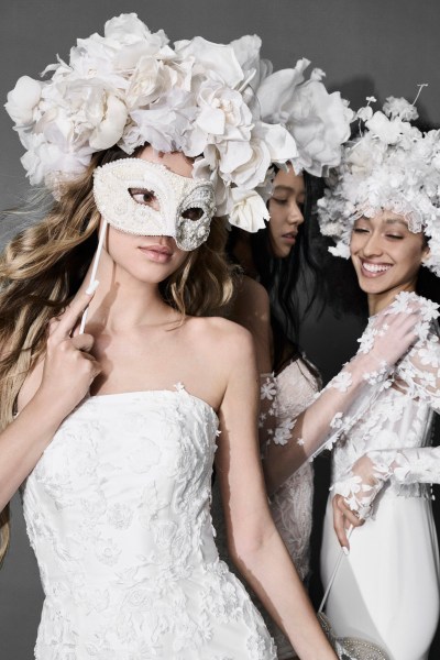 Vera Wang Bride 2024 Collection models brides posing with veils mesh short bralette dresses gowns with white feather face masks