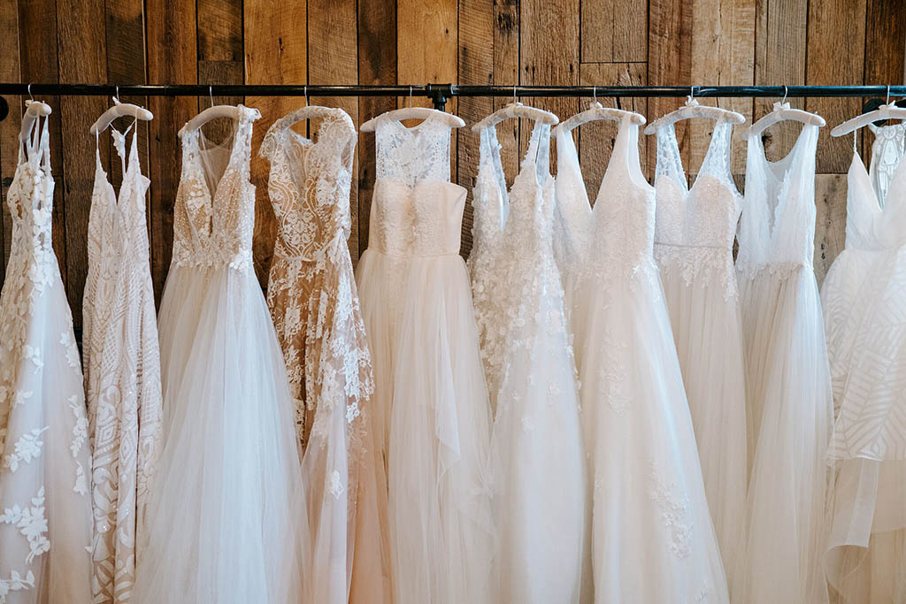 Wildflower dresses hanging on a rail