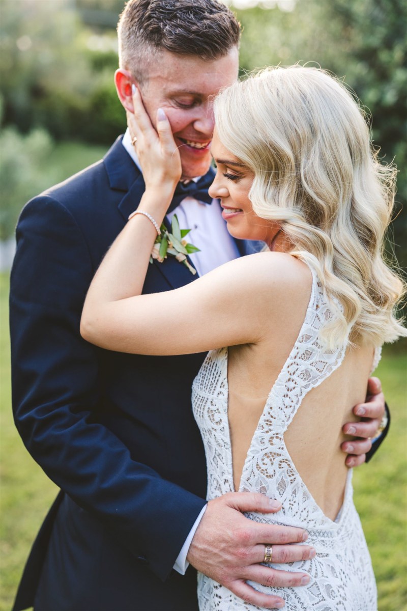 Bride and groom embrace during Italy wedding