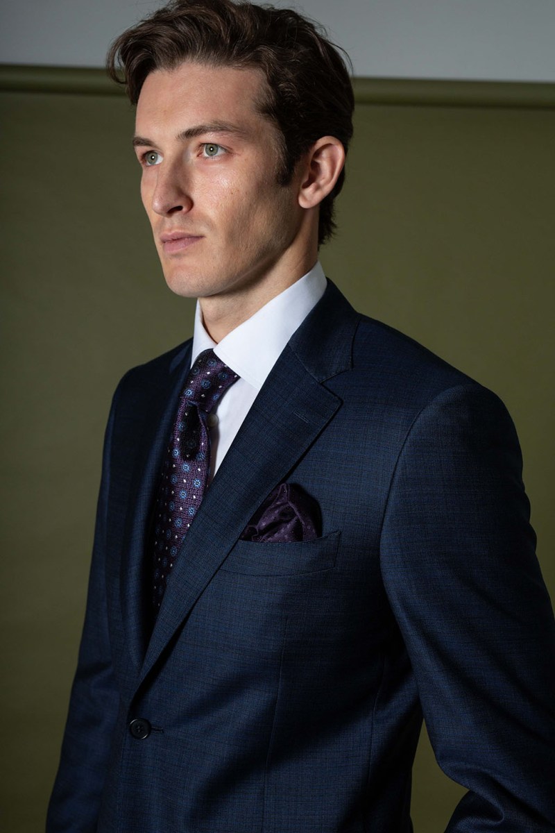 Male model wearing Louis Copeland & Sons wedding suit