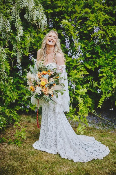 Bride in lace gown with statement sleeves during Lyrath Estate wedding