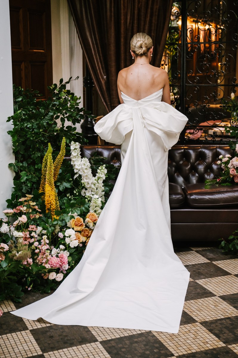 Bride in bow wedding dress during her Langtons wedding